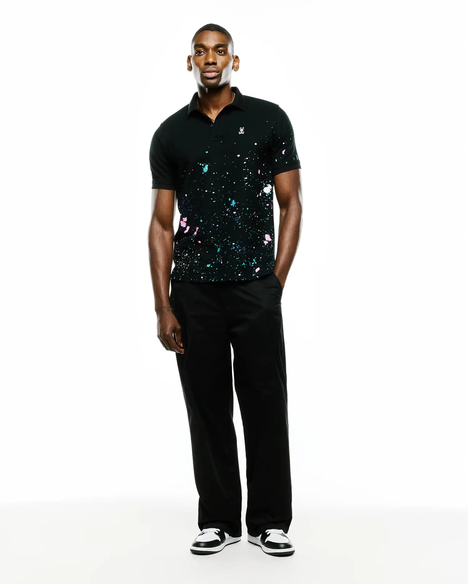 Psycho Bunny Men's Polos Malcolm Splatter Polo polo nera in cotone Pima