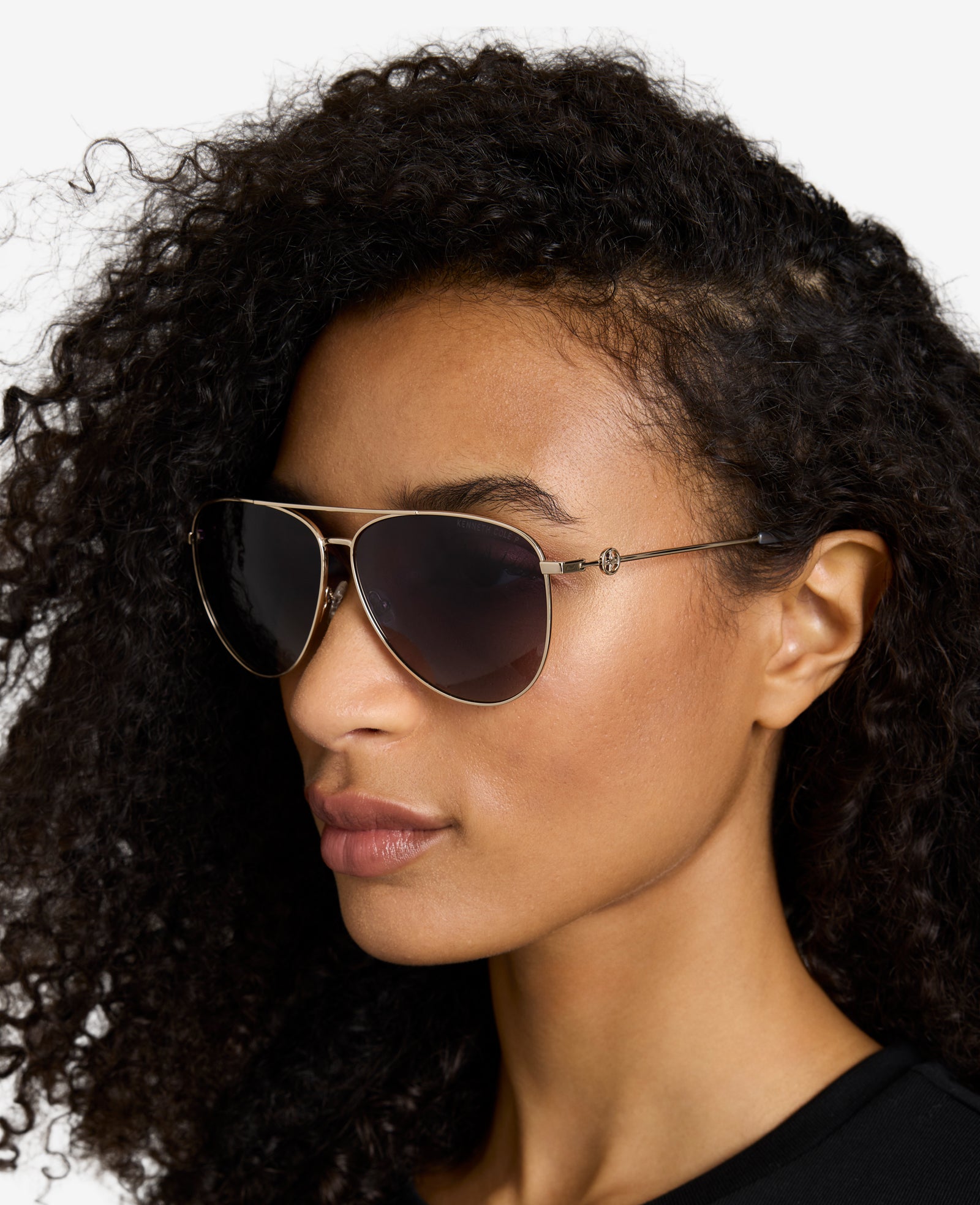 Kenneth Cole Reaction Sunglasses & Eyewear Pilot Titanium Aviator Sunglasses occhiali oro polarizzati