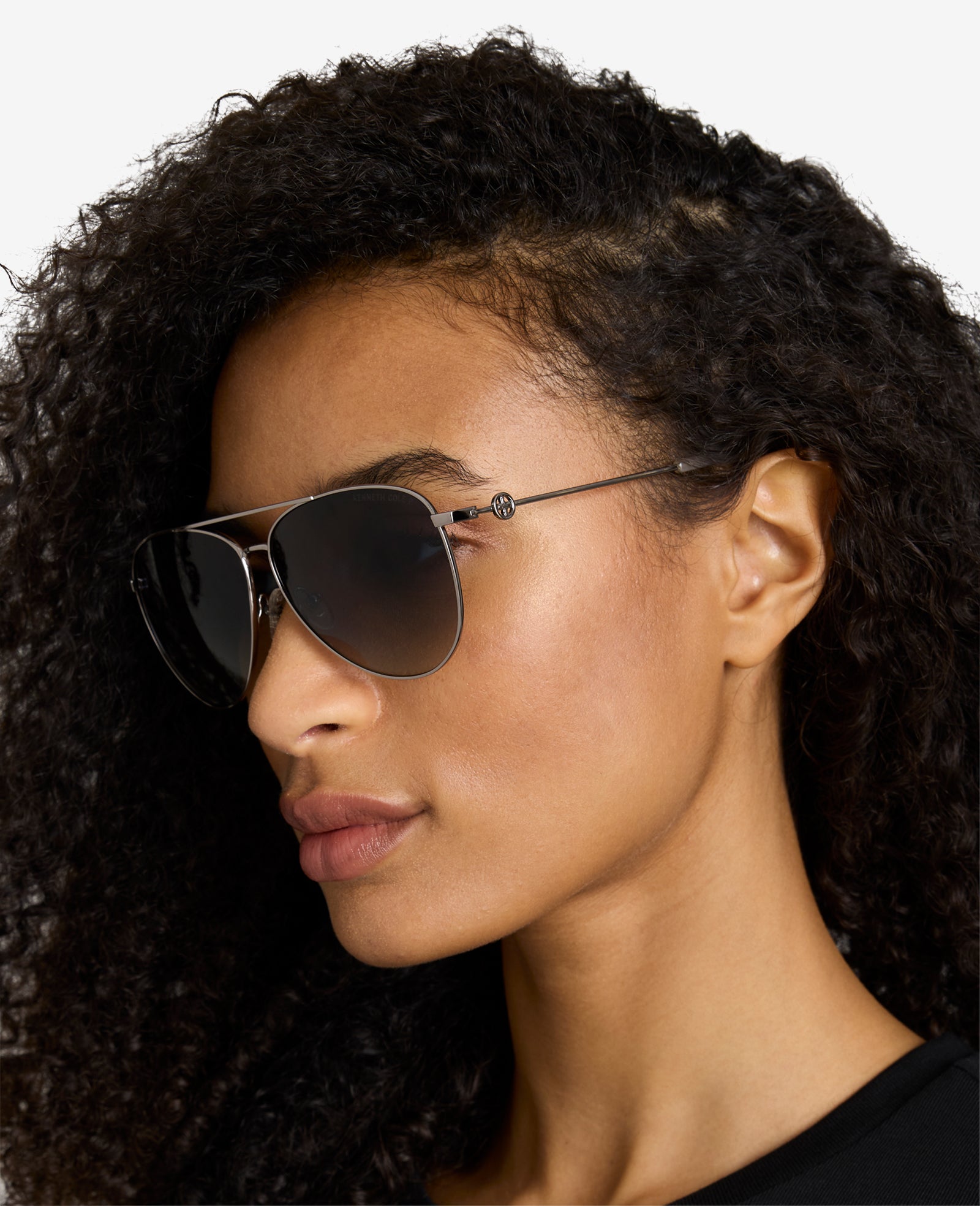 Kenneth Cole Reaction Sunglasses & Eyewear Pilot Titanium Aviator Sunglasses occhiali da sole nickel