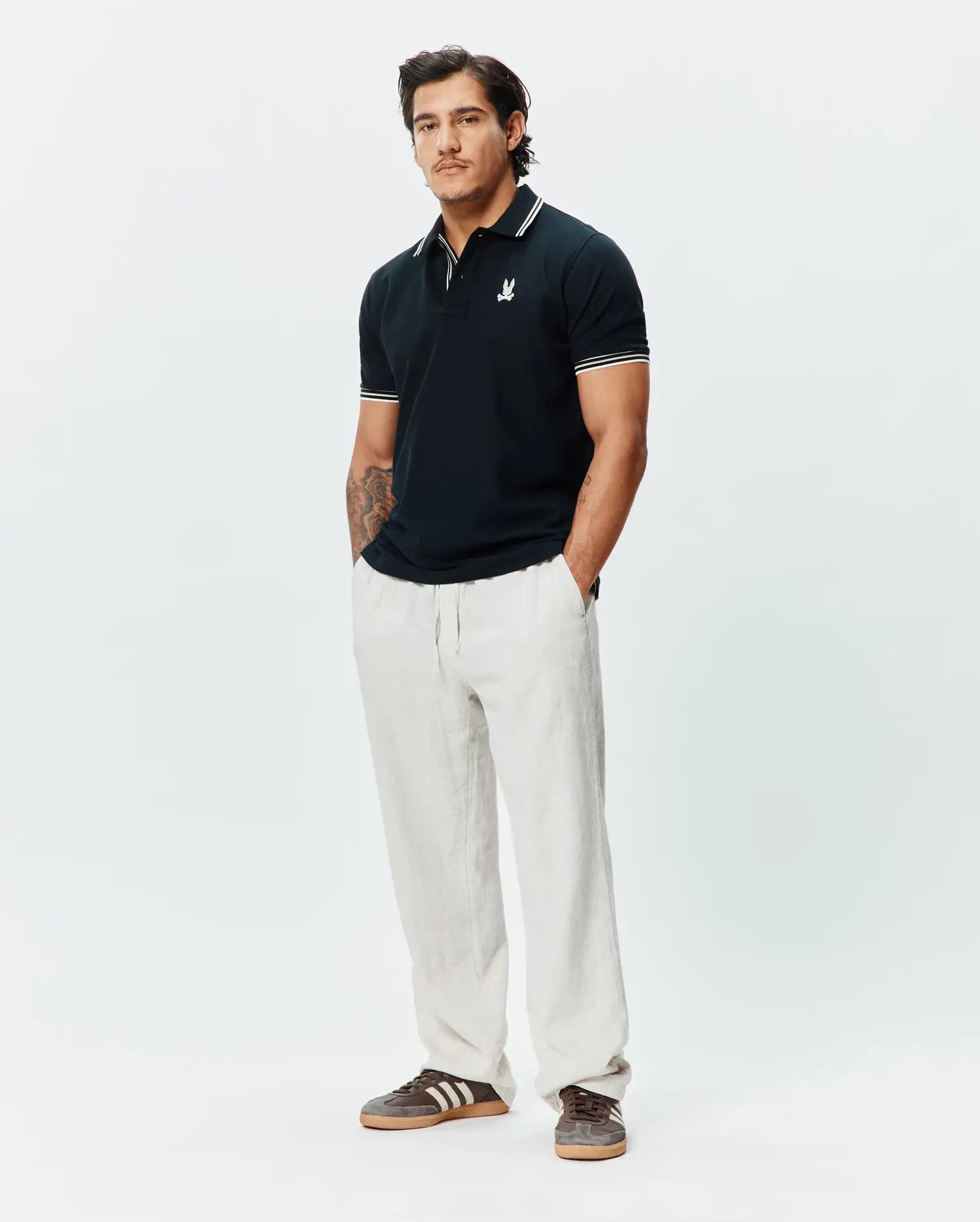 Psycho Bunny Men's Polos Brad Pique Polo polo nero in cotone Pima