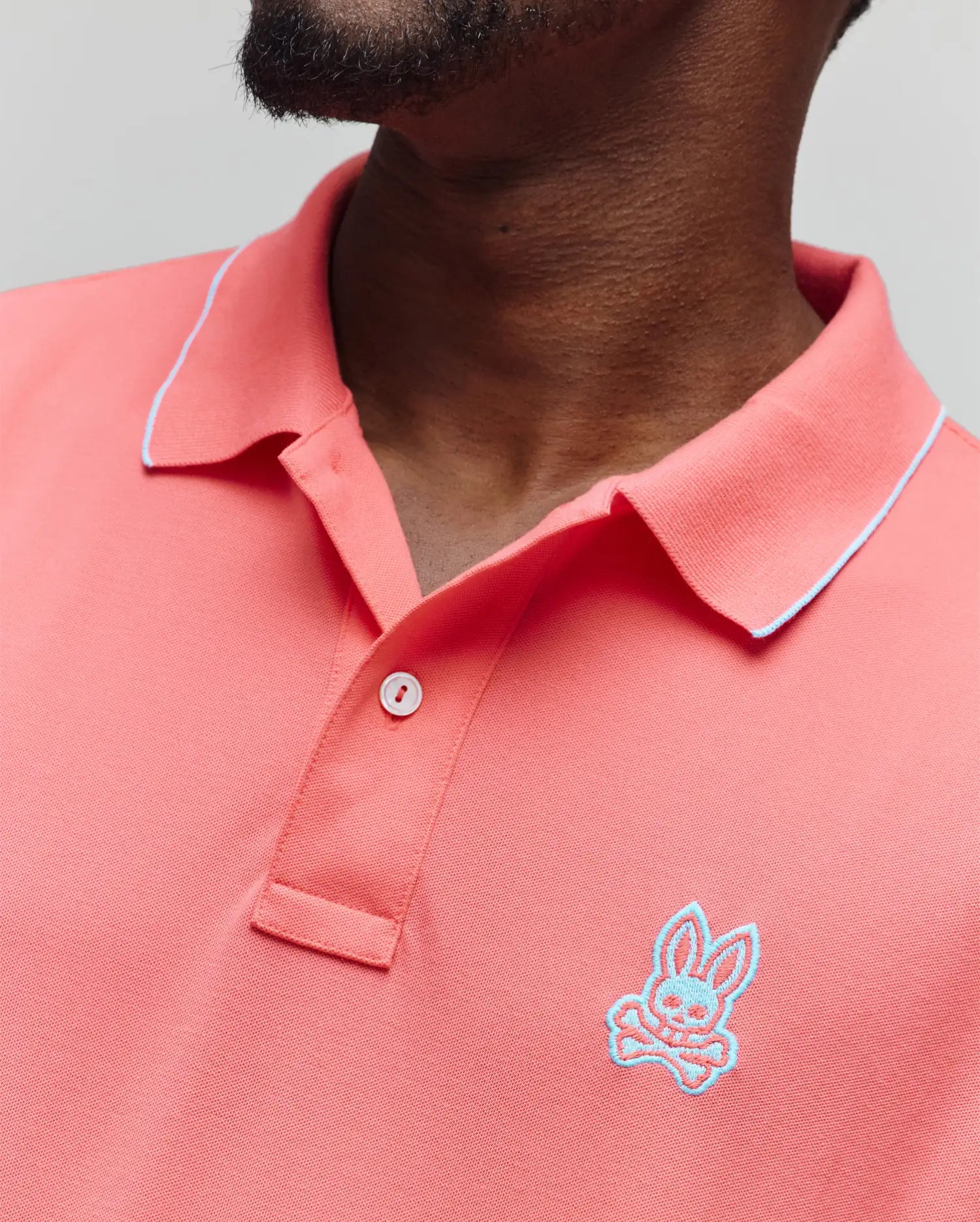 Psycho Bunny Men's Polos Lachlan Pique polo uomo corallo sunkissed vestibilità regular