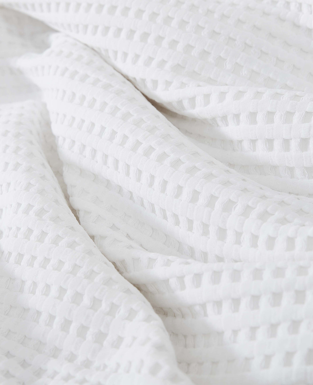 Kenneth Cole Reaction Home & Bedding Reversible Solid White Waffle Comforter Set trapunta bianca