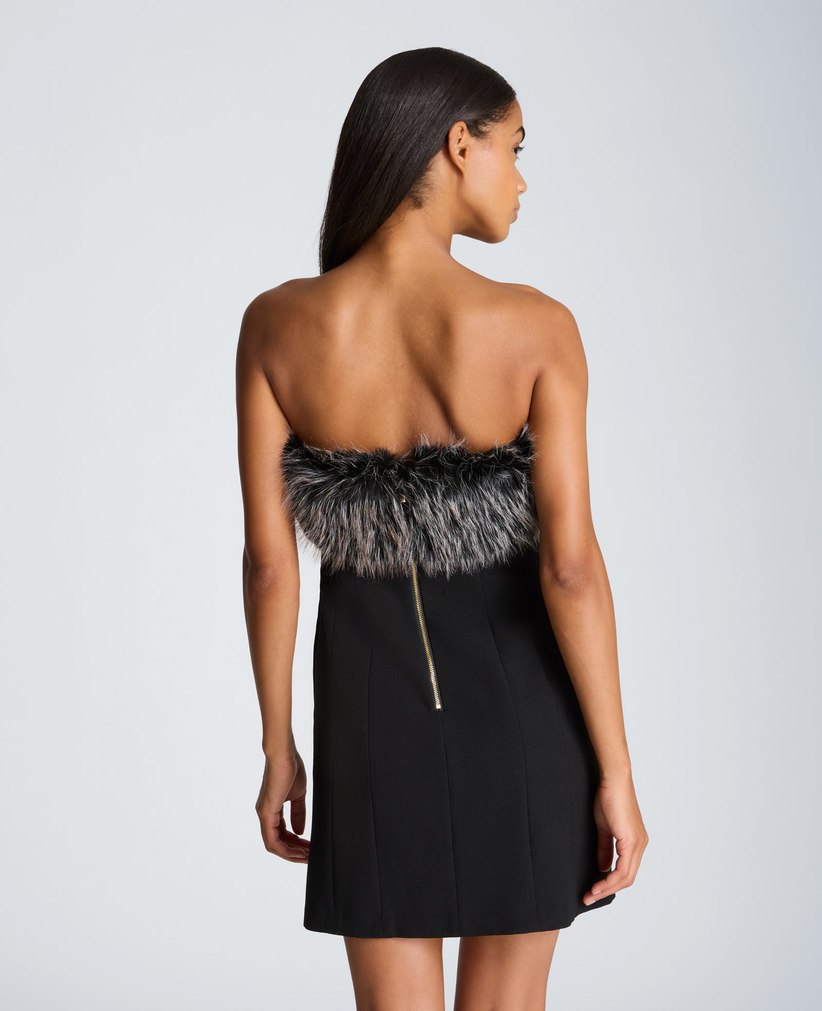Kenneth Cole Reaction Strapless Hourglass Mini Dress abito corto nero con bordo in ecopelliccia