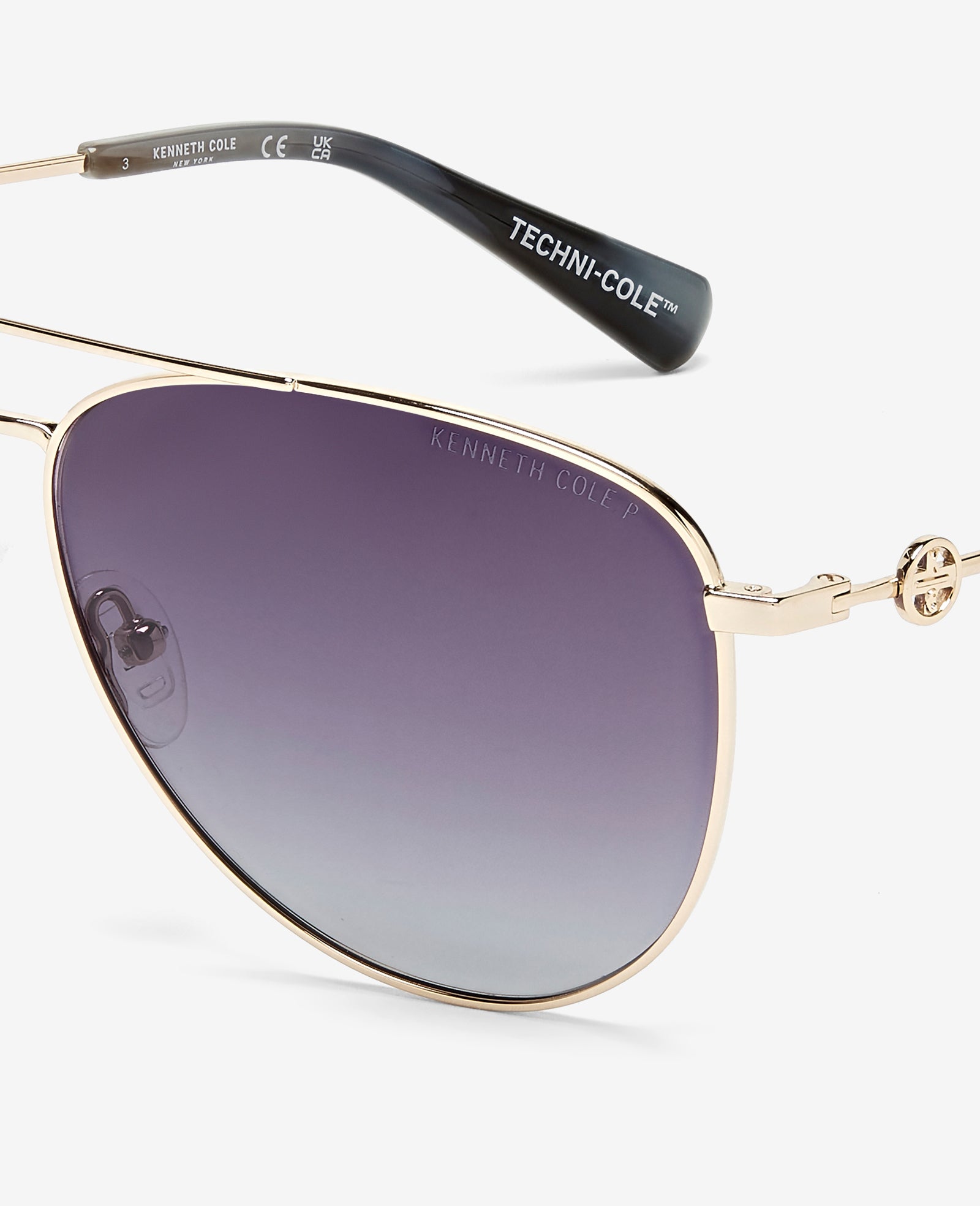 Kenneth Cole Reaction Sunglasses & Eyewear Pilot Titanium Aviator Sunglasses occhiali oro polarizzati