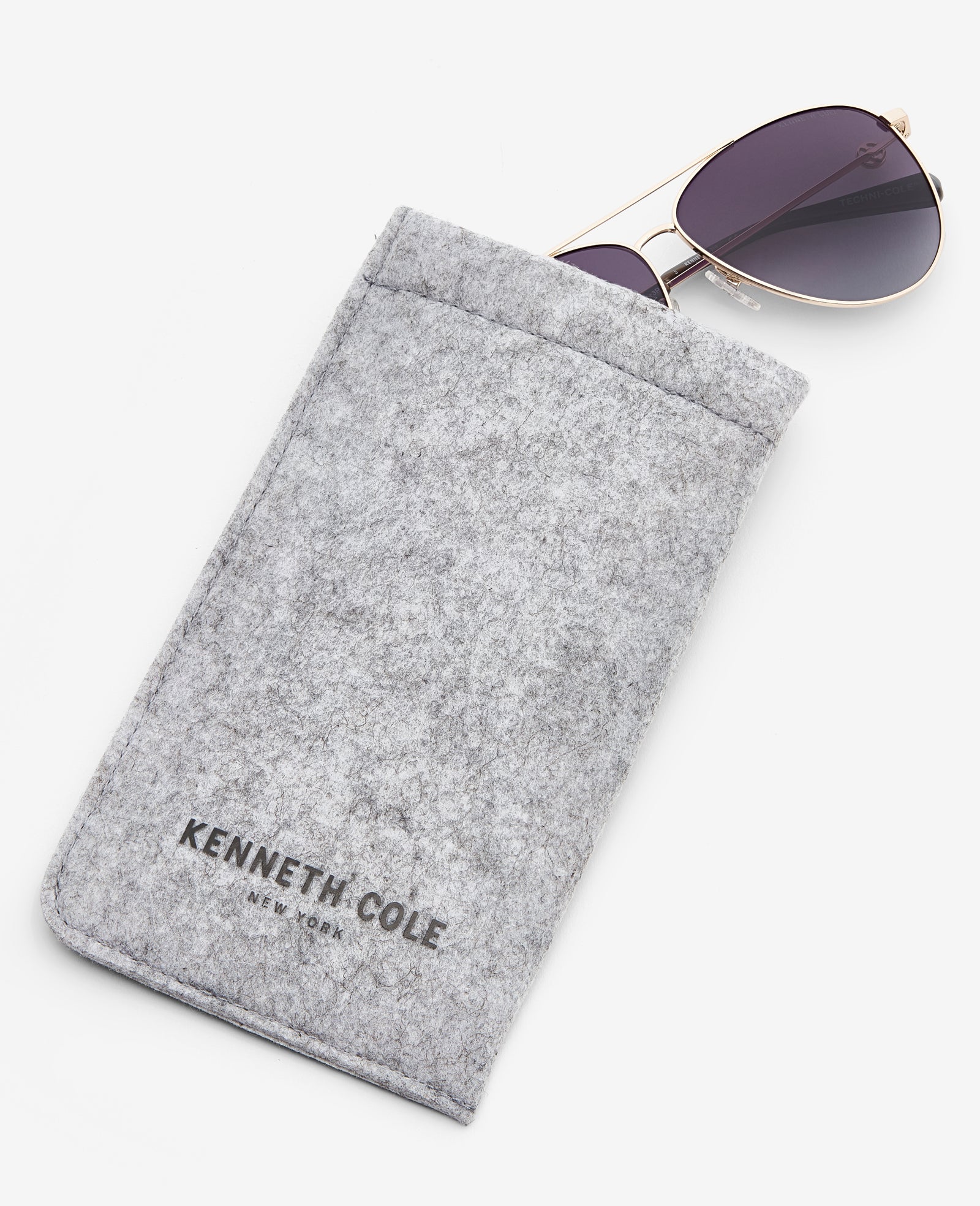 Kenneth Cole Reaction Sunglasses & Eyewear Pilot Titanium Aviator Sunglasses occhiali oro polarizzati