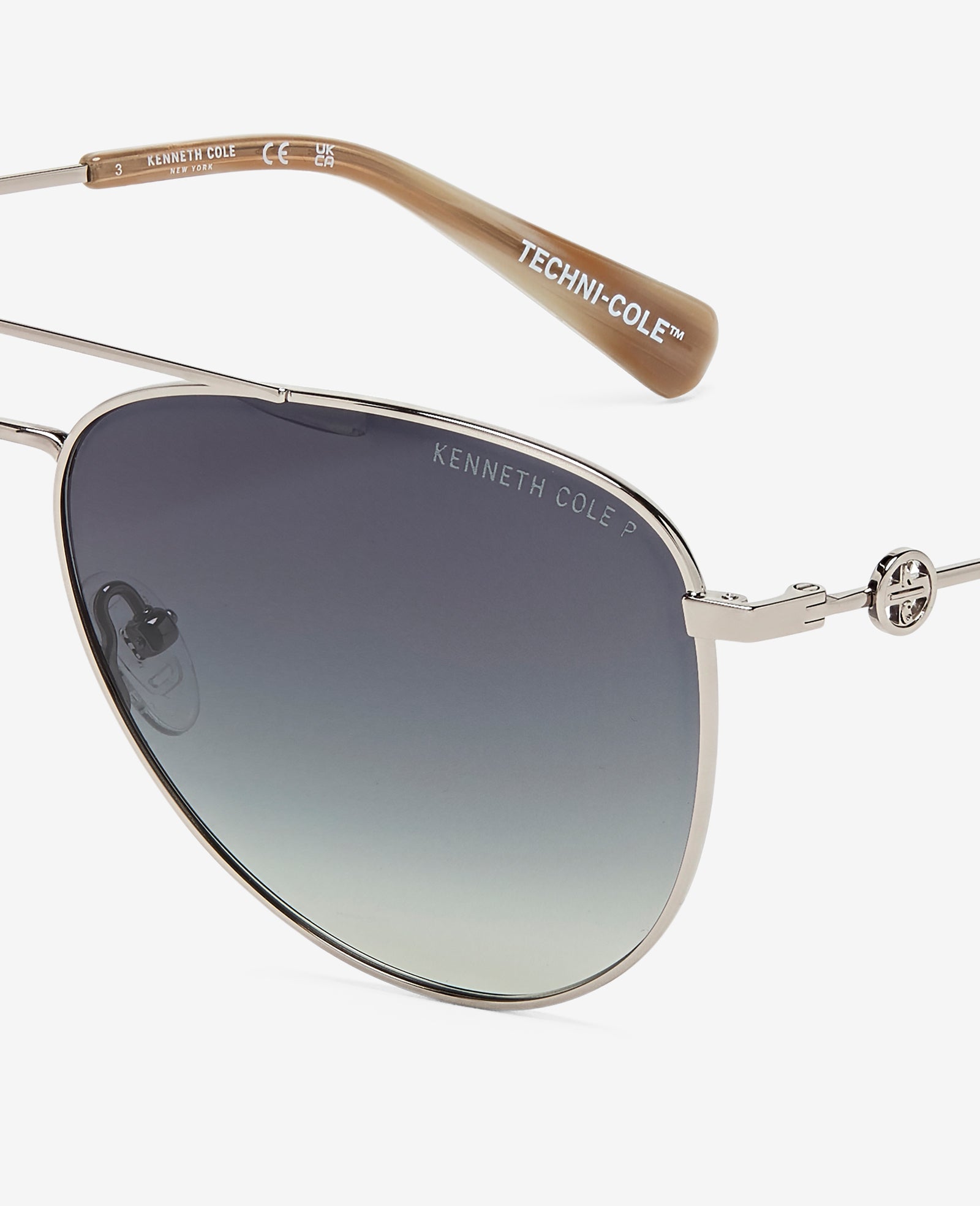Kenneth Cole Reaction Sunglasses & Eyewear Pilot Titanium Aviator Sunglasses occhiali da sole nickel